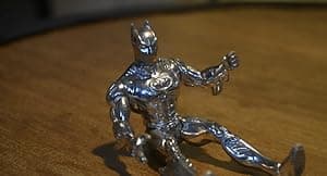 Epic dinosaur and Batman fight